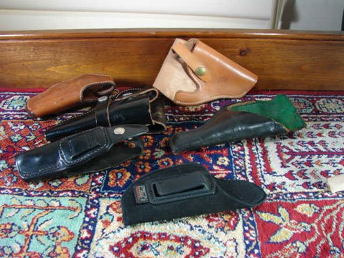 6 Hip Holsters. Various makes. Five are leather.
