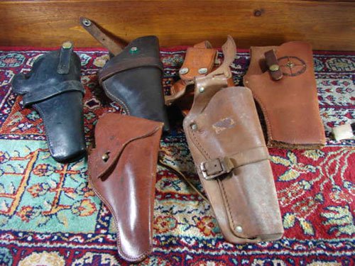 6 Vintage Leather Pistol Holsters. Various makes.