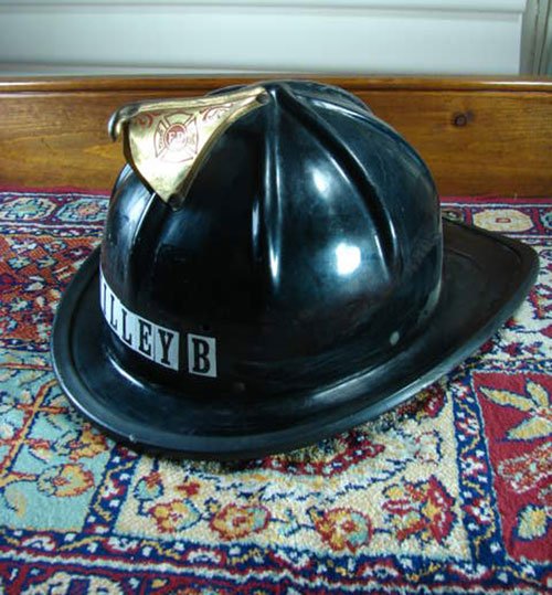 Cairns Vintage Firemen's Helmet. 6 1/2" h x 14" lon