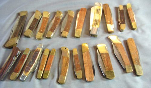 Lot of 20 Jack Knives. Most marked "Stainless", al: Lot of 20 Jack Knives. Most marked "Stainless", also Imperial North American Hunting Knife, Sabre, etc. Range from 2 1/2" long to 4" long.