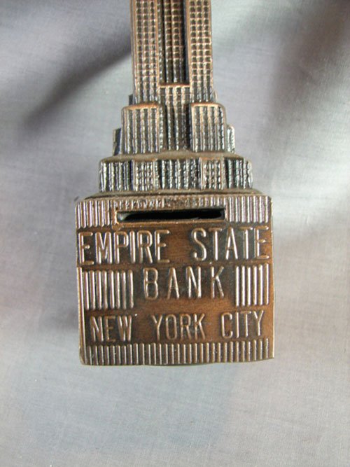 Two Empire State Building Metal Banks. 7 3/4"h x 2 - 3