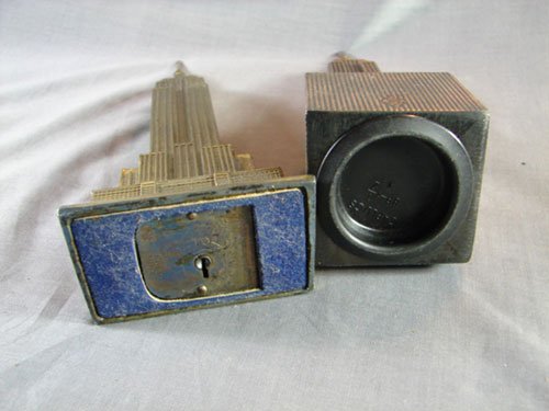 Two Empire State Building Metal Banks. 7 3/4"h x 2 - 5