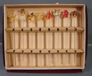 Set of 8 Figural Glass Swivel Sticks. Depicting
