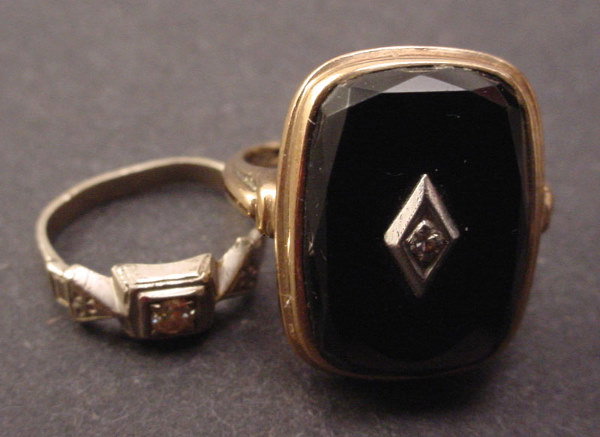 Two 10k Gold Ladies Rings. Each with small diamond