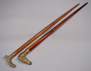 Two 20th c. Walking Sticks with Brass Heads