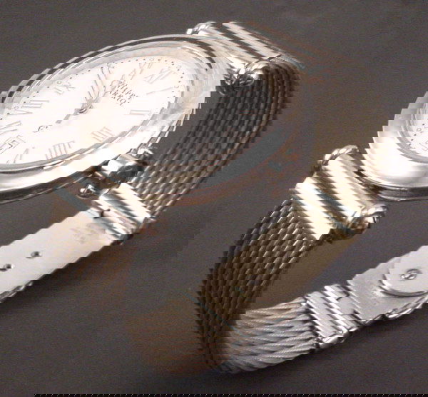 Philippe Charriol Watch. Round Stainless Steel cas: Philippe Charriol Watch. Round Stainless Steel case, white dial, stainless steel cable bracelet. Quartz. Serial Number 41.97.4187.