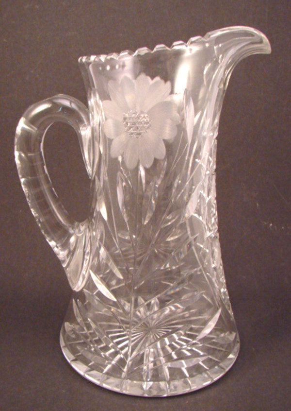 Cut and Leaded Glass Pitcher. 10 1/4"h. Some scratc
