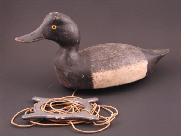 Roy Conklin Duck Decoy with plaque on bottom reads: Roy Conklin Duck Decoy with plaque on bottom reads "Donald B. Baxter, Syracuse, N.Y.". Approximately 6 1/2"h x 12"w x 5 1/2"