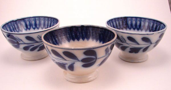 Three Maestricht Flow Blue Spinach Pattern Bowls: Three Maestricht Flow Blue Spinach Pattern Bowls. All Imprinted marks on bottom. 3 ¼"h x 5 3/8" diam, 3 ¼"h x 5 3/8" diam and Three small flakes to rim. 3 ¼"h x 5 3/8" diam. (Dutch, Delft like) man