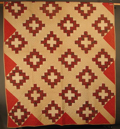 Antique Handsewn Quilt with white cross design. M: Antique Handsewn Quilt with white cross design. Marked on paper tag "Lillian Bellinger". Some staining. 91" x 69"