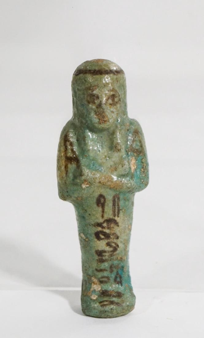 ANCIENT EGYPTIAN FAIENCE USHABTI OLD KINGDOM: (c. 2600 to 2100 B.C.E) Ex Canadian private collection. height: 3.75in.