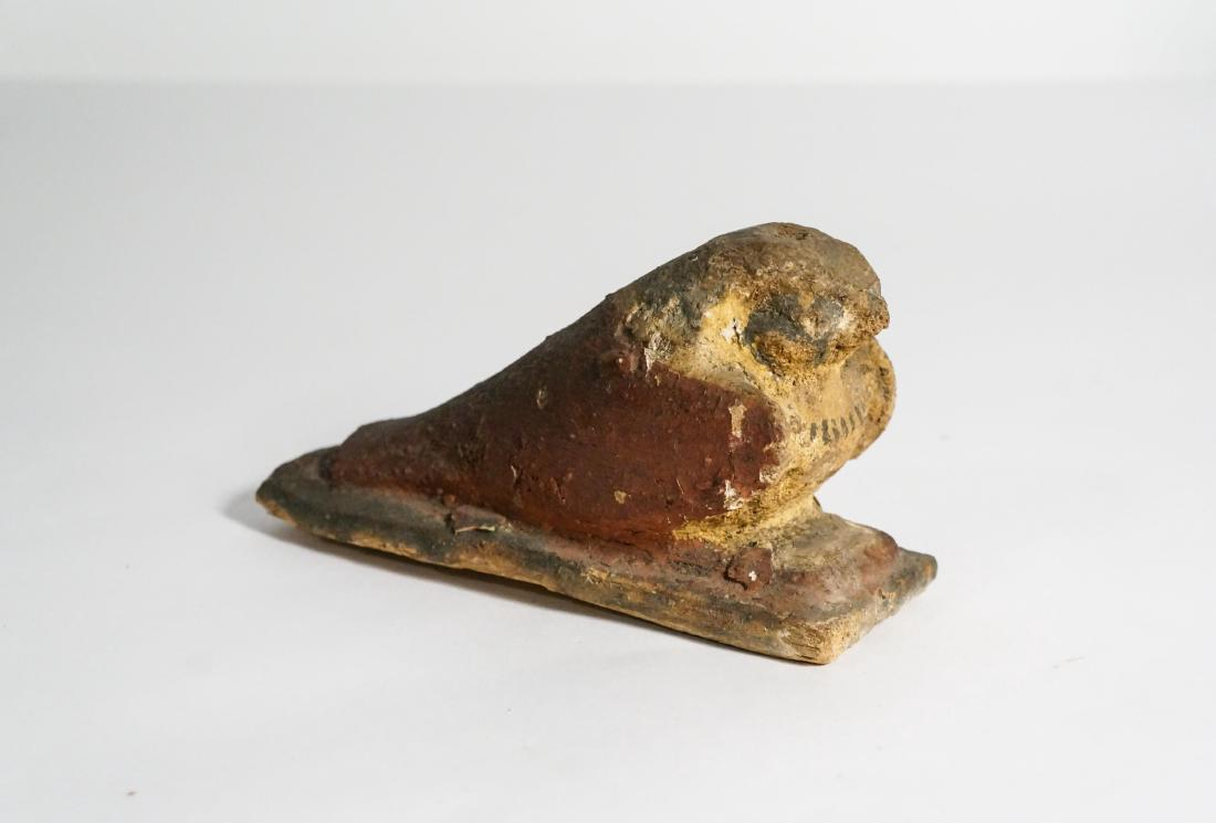 ANCIENT EGYPTIAN WOODEN FALCON: probably 600BC - 400 BC, Ex Gainesville, Florida,private collection. height: 2.5in, length: 4.75in.