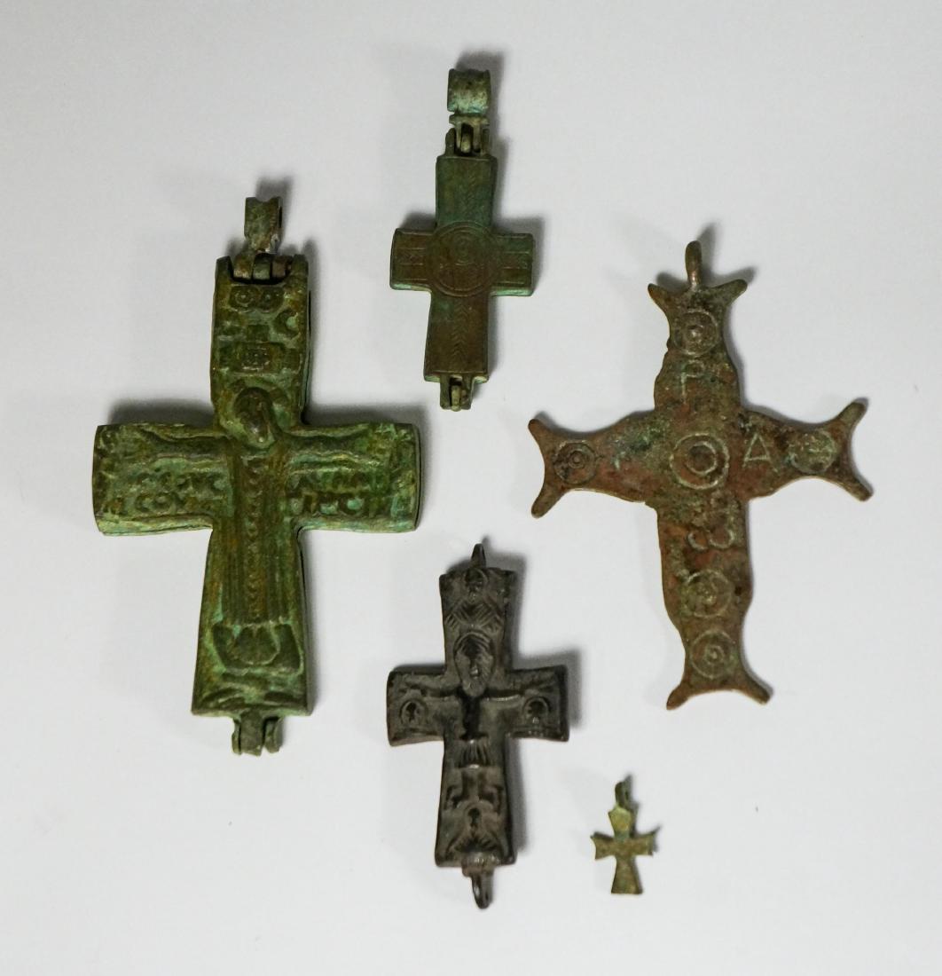 Â 5 ANCIENT BYZANTINE BRONZE CROSSES: Probably 600AD -800AD. Smallest: Height: 1in, Width: 0.5in; Biggest: Height: 4.5in, Width: 2.75in.