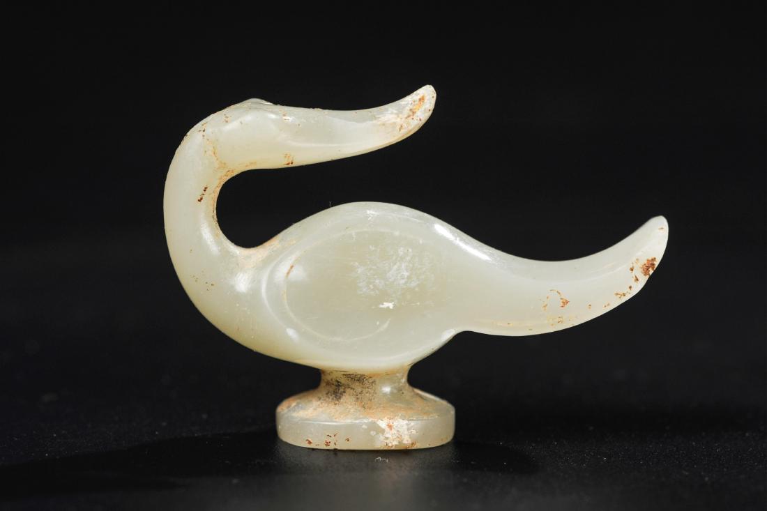 CHINESE HAN DYNASTY WHITE JADE BELT BUCKLE: han dynasty. Dimension: 1.7 x 1.2 x 0.6 inches, 4.3 x 3 x 1.5 cm.