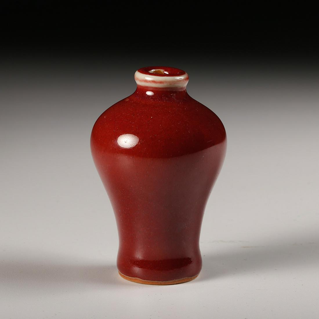 CHINESE OX BLOOD GLAZE SNUFF BOTTLE: Height: 2.4 inches. Height: 6.2cm