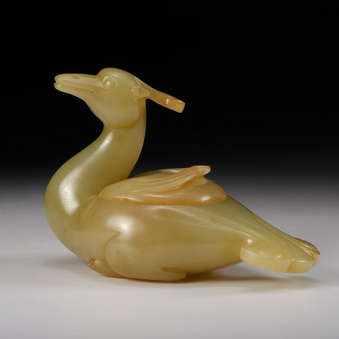 A Chinese Archaistic Jade Bird: A Chinese Archaistic Jade Bird Length: 4.1 inches. Width: 2.4 inches. Height: 2.8 inches. Length: 10.3cm Width: 6.2cm Height: 7cm Weight: 219.4g