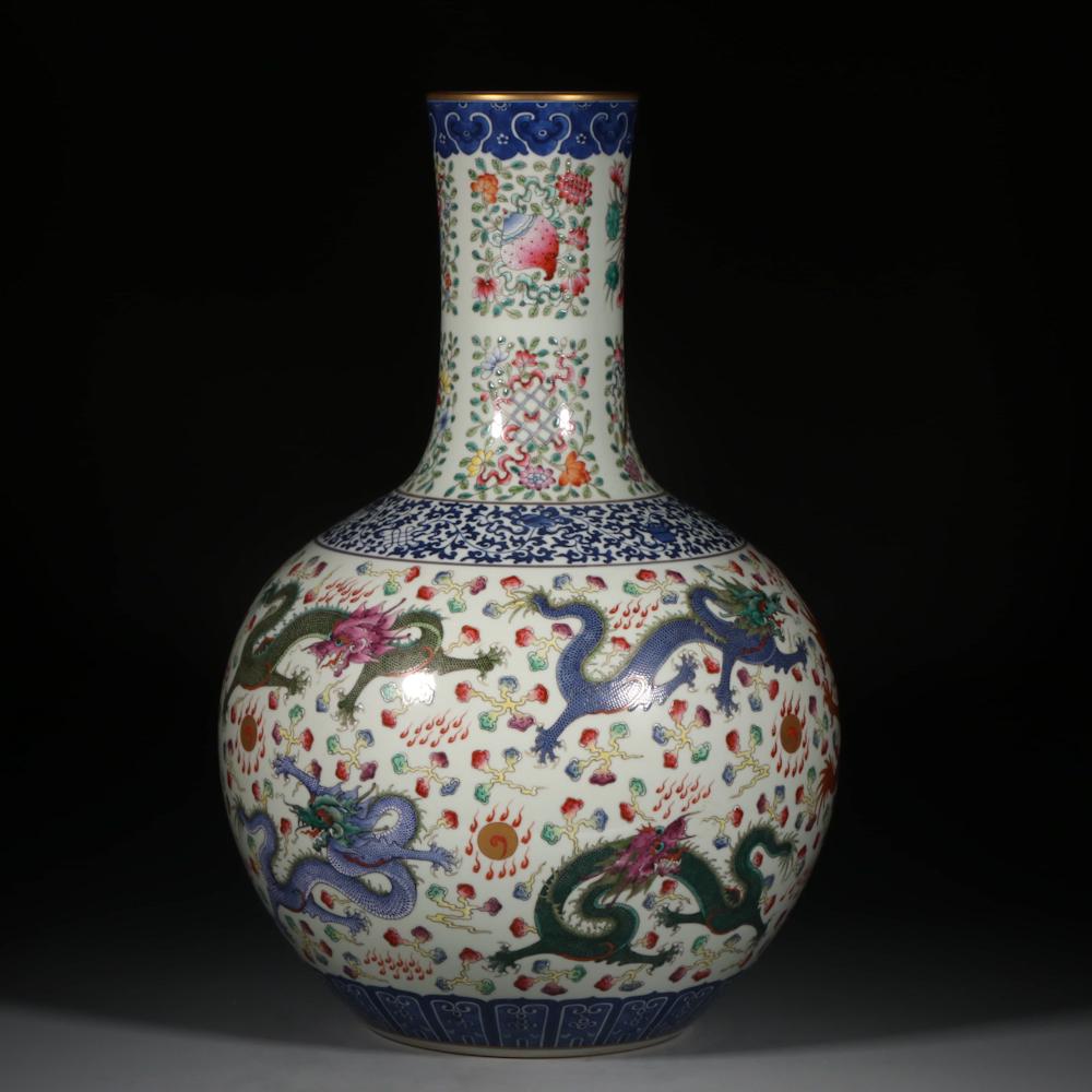 A Chinese Famille Rose Dragon Pattern Porcelain: A Chinese Famille Rose Dragon Pattern Porcelain Tianqiuping Height:22 inches. 7.9 inches. Height:56cm, Diam.20cm,
