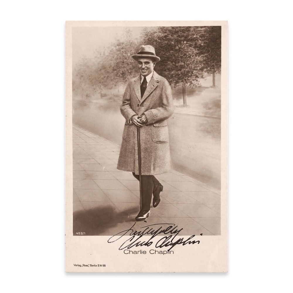 CHARLIE CHAPLIN SIGNED POSTCARD: 5 3/8 x 3 3/8 in (13.5 x 8.7 cm) Provenance and Authentication: This collectible has undergone a rigorous forensic evaluation. The signatures were carefully analyzed across multiple criteria, includin
