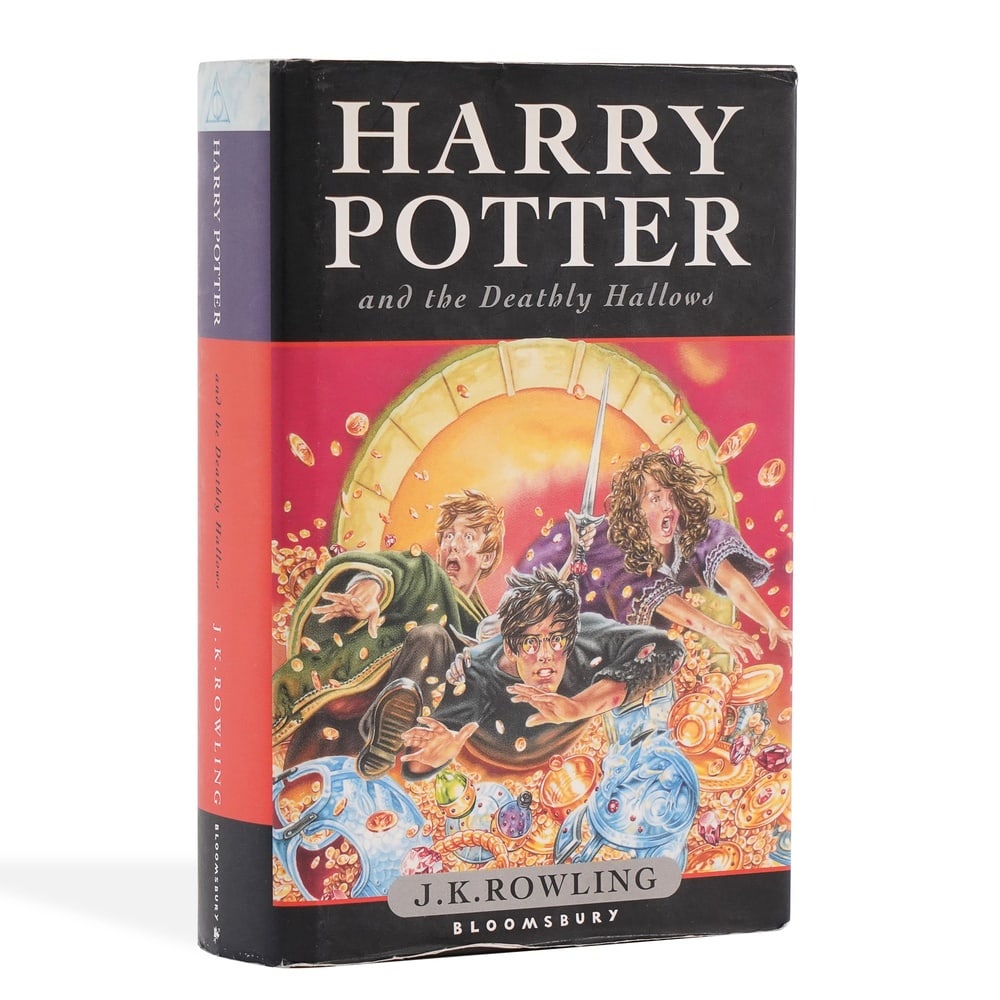 J.K. ROWLING SIGNED "HARRY POTTER AND THE DEATHLY HALLOWS" FIRST EDITION: 8 1/8 x 5 3/8 in (20.5 x 13.5 cm) J.K. Rowling's Harry Potter series stands as one of the defining literary phenomena of the late twentieth and early twenty-first centuries, reshaping children's and