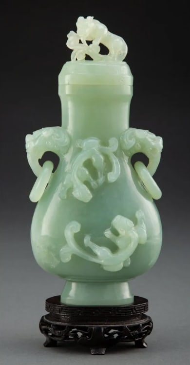 A Chinese Carved Celadon Hardstone Covered Vase (1 of 2)