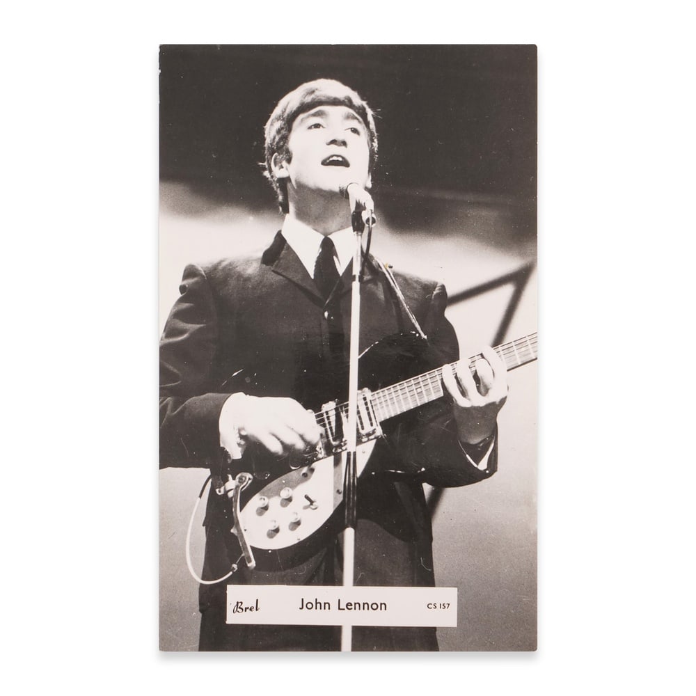JOHN LENNON SIGNED POSTCARD: 5 1/2 x 3 3/8 in (13.9 x 8.6 cm) Provenance and Authentication: According to the Letter of Authenticity (LOA) and Certificate of Authenticity (COA) provided by the consignor, this collectible was