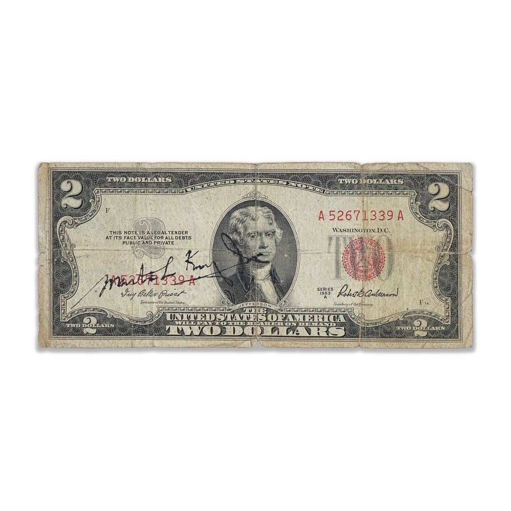 MARTIN LUTHER KING JR. SIGNED 1953A TWO DOLLAR NOTE: 6 1/8 x 2 1/2 in (15.5 x 6.5 cm) Provenance and Authentication: According to the Letter of Authenticity (LOA) and Certificate of Authenticity (COA) provided by the consignor, this collectible was