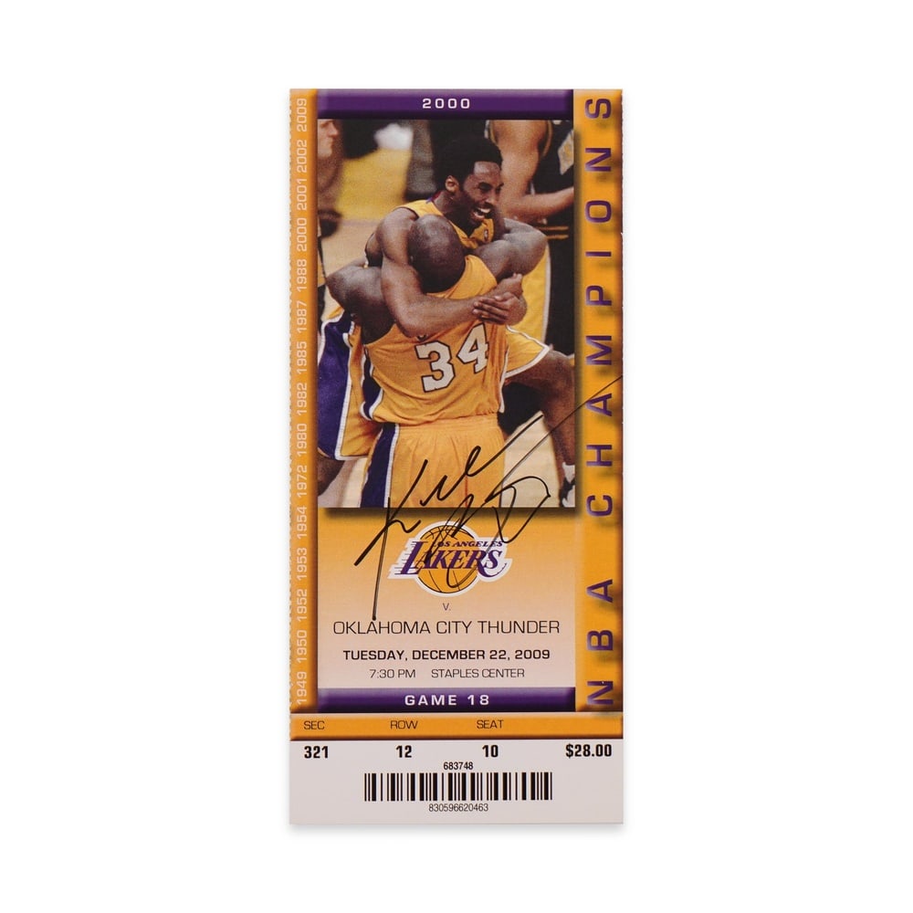 KOBE BRYANT SIGNED LAKERS COMMEMORATIVE GAME TICKET, DECEMBER 22, 2009: Image Dimensions: 6 3/4 x 3 in (17.1 x 7.6 cm) Provenance and Authentication: According to the Letter of Authenticity (LOA) and Certificate of Authenticity (COA) provided by the consignor, this collec