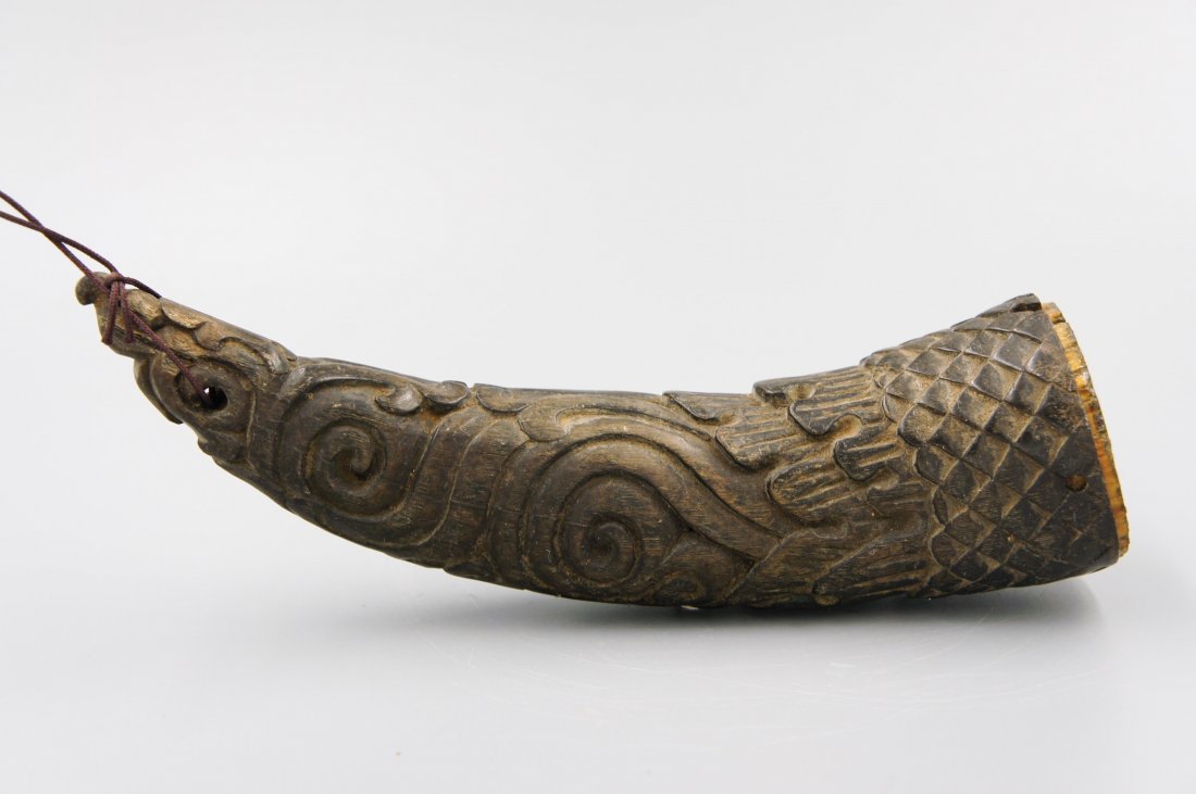 18TH CENTURY TIBETAN CARVED OX HORN: 18th century tibetan, used as a ritual object, 18 cm long