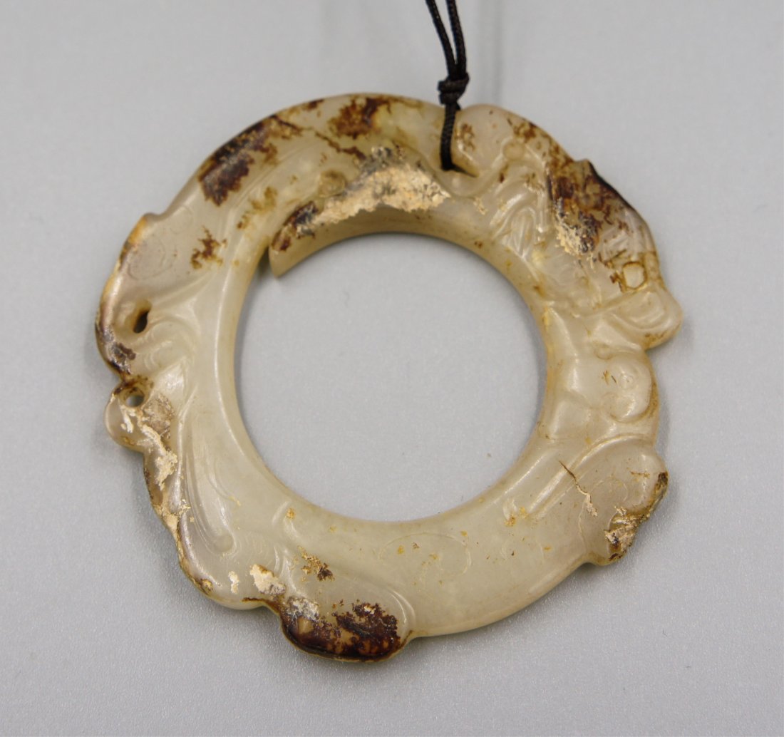 CHINESE HAN DYNASTY DRAGON JADE RING PENDANT: han dynasty; 5.5 cm Provenance: Virginia Private collector