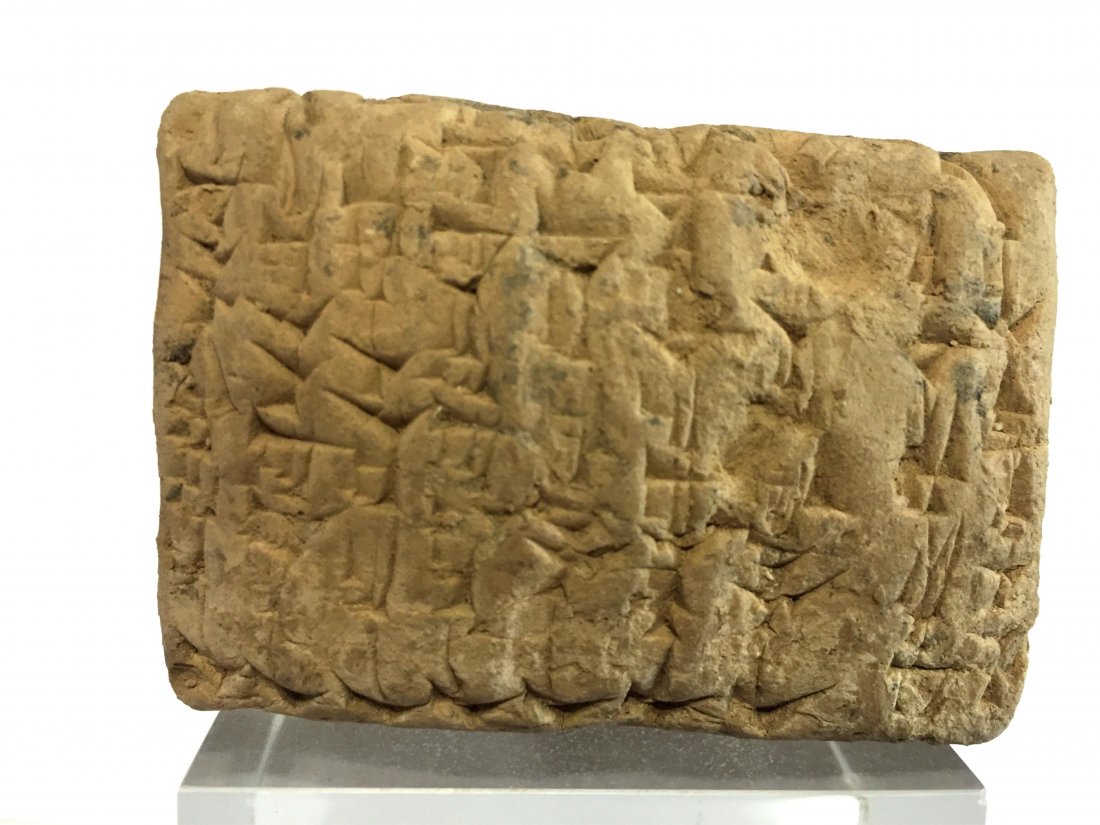 ANCIENT NEAR EASTERN CLAY TABLET: Ancient Near Eastern Clay tablet circa 2100-2000 BC. Sumerian ,well preserved and detailed baked clay tablet with cuneiform script on the two main faces. Size : 7 cm x 5 cm