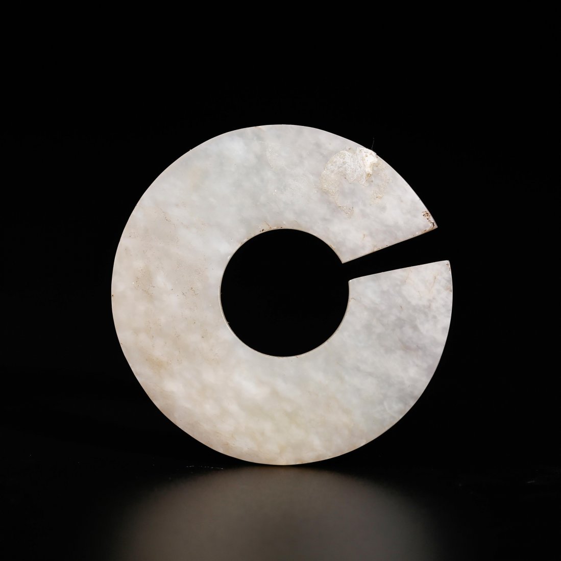 CHINESE JADE DISK: western zhou dynasty. Outer diameter: 4.8cm, inside diameter; 1.8cm, thickness: 0.2cm, weight; 9.3g very good condition.
