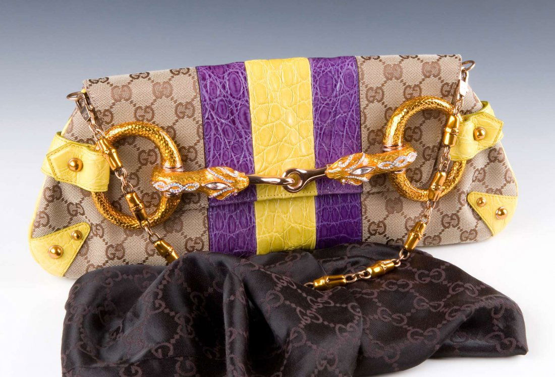 Gucci Flap 1921 Dragon Bag Collection: Flap Shoulder Bag 1921 Gucci from the Spring/Summer 2004 collection designed by Tom Ford. Fabric monologue with central leather crocodile purple and yellow, purple satin lining, reports the number fro