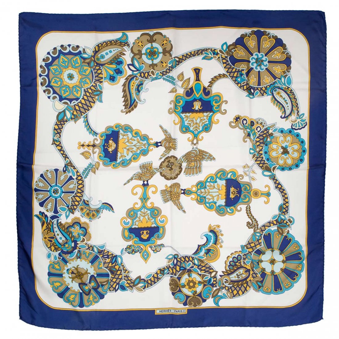 Hermès Foulard: Carrè Hermès scarves designed by Karin Swildens artist and designer, in 1972. Size 90x90 cm 100% silk, belongs to the collection "Cendrillon", blue on white with details of yellow, taupe and brown. 
