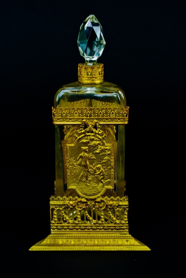 ORMOLU MOUNTED BACCARAT PERFUME BOTTLE: 11.5" High. Estimate $400-500
