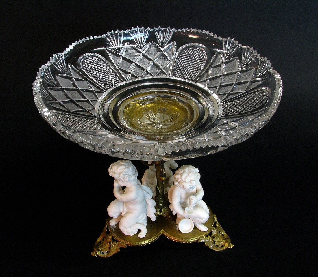 A GILT BRONZE AND BISQUE PORCELAIN CENTERPIECE (1 of 2)