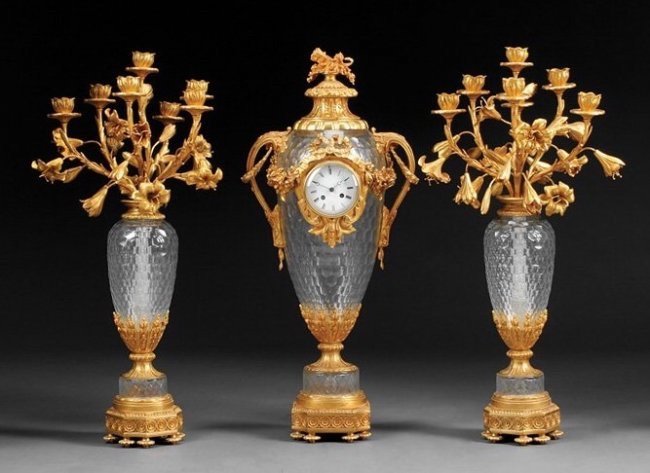 AN IMPOSING ORMOLU MOUNTED CUT CRYSTAL CLOCK GARNITURE (1 of 1)