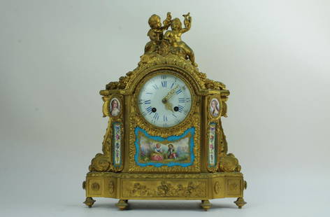 19th century French gilt Sevres pattern mantel clock: 19th century French gilt Sevres pattern mantel clock with ornate enamel dial.H: 16 W: 14 D: 6 inches