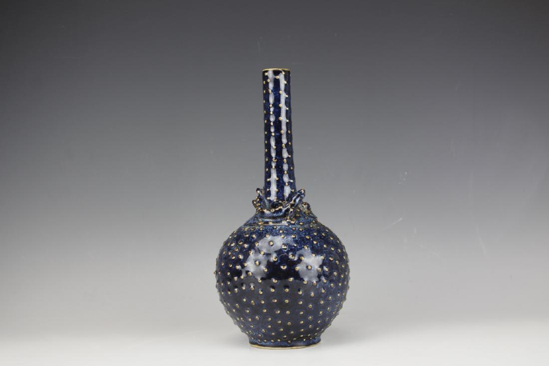 A Pearl Dotted Blue-Glazed Long Neck Vase Bat and Gecko: A Pearl Dotted Blue-Glazed Long Neck Vase with Bat and GeckoH: 10.5 D: 5 Inches