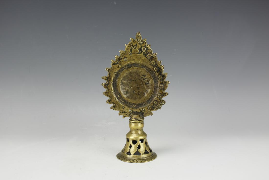 A Tibetan Buddhist Bronze Mirror: H: 8 inches