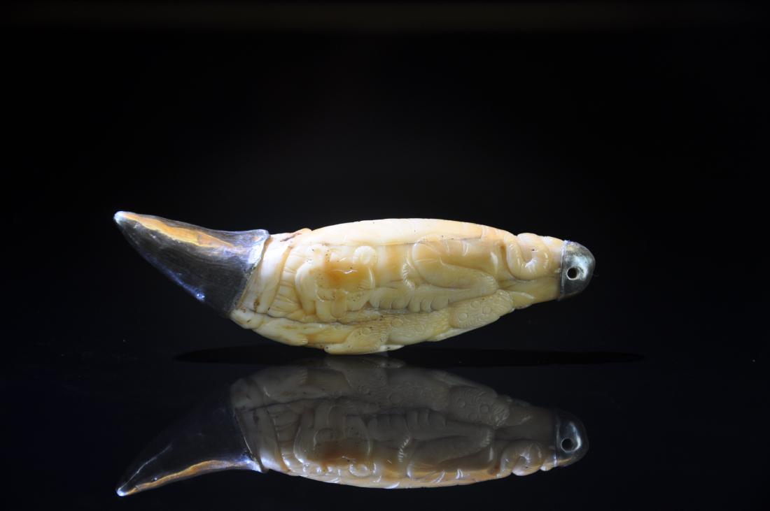 Silver Carved Cattle Tooth of Tiger: Silver Carved Cattle Tooth of Tiger from Qing Dynasty (1644 - 1912). W: 3.1" (8cm)