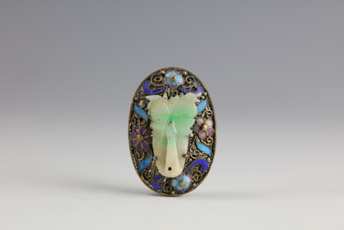 A Jade Silver Pandent: A Jade Silver Pandent H: 7 /8 inches/2.3 cm W:1 3/8 inches/3.5 cm Weight 8g