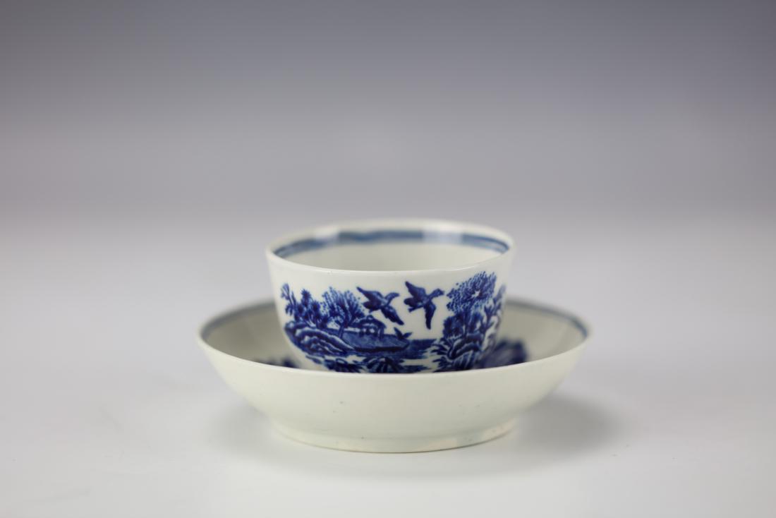 A Blue and White FLORAL Royal Worcester Teacup and: A Blue and White FLORAL Royal Worcester Teacup and Saucer Circa 1783. Provanance: Christie's Auction. Cup H: 1.75 in. (4.45 cm.) D: 2.1 in. (5.33 cm.) Saucer D: 4.15 in. (10.54 cm.)
