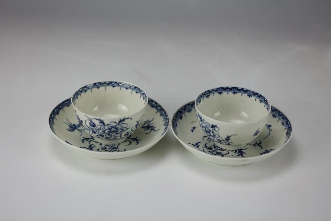 A Pair of Blue and White BUTTERFLY Royal Worcester: A Pair of Blue and White BUTTERFLY and FLORAL Royal Worcester Teacups and Saucers Circa 1765 to 1770. Cups H: 1.75 in. (4.45 cm.) D: 3 in. (7.62 cm.) Saucers D: 4.75 in. (12.07 cm.)