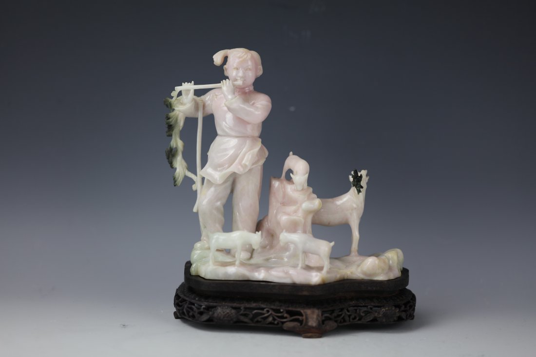 A Chinese Pink Nanyang Jade Carved Girl and Goats 20th: A Chinese Pink Nanyang Jade Carved Girl and Goats 20th Century,Size H:8.5 in.(21.5 cm) W:7 in. (18 cm). Exhibited: Preview are available from November 18th to 22nd from 11:00AM TO 5:00PM Eastern Time 