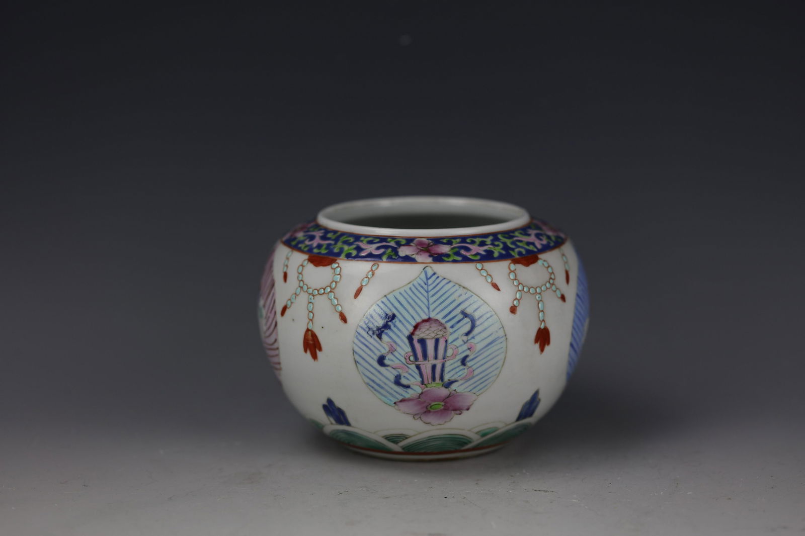 A Famille Rose Buddhism Symbols Brush Waher with: A Famille Rose Buddhism Symbols Brush Waher with Qianlong Mark. 3.74 in. (9.5 cm.) Exhibited: Preview are available from November 18th to 22nd from 11:00AM TO 5:00PM Eastern Time Location: 15229 Displ