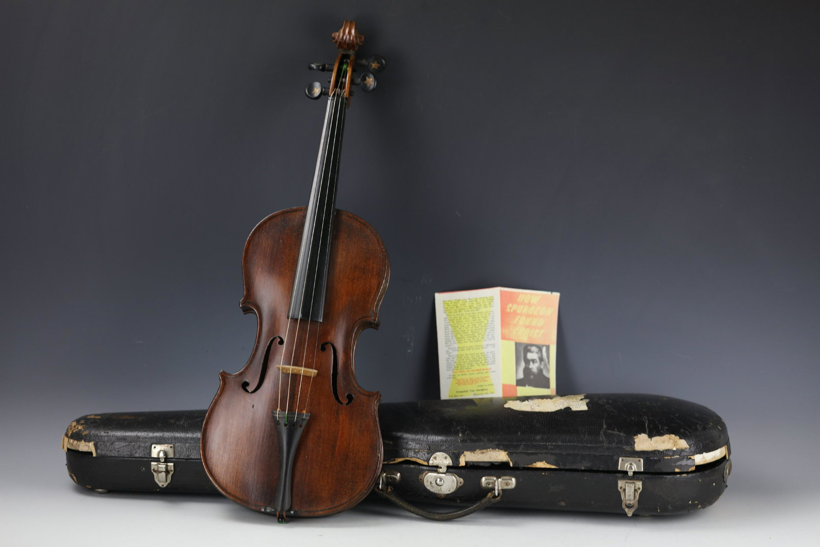 A Violin by Antonius Stradivaruis Made in Czecho: A Violin by Antonius Stradivaruis Made in Czecho Slovakia with Original Case. H: 23 in . (58.42 cm.) Exhibited: Preview are available from November 18th to 22nd from 11:00AM TO 5:00PM Eastern Time Loc
