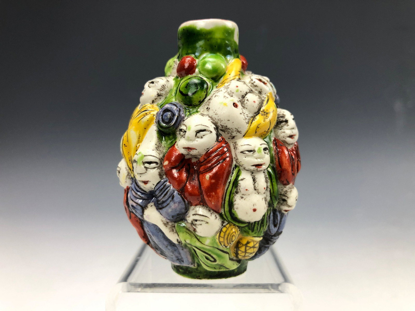 A LIONS Blue and White Under Glaze Red Snuffle Bottle: A LIONS Blue and White Under Glaze Red Snuffle Bottle with Daoguang Mark H: 3.25 in (8.26 cm)