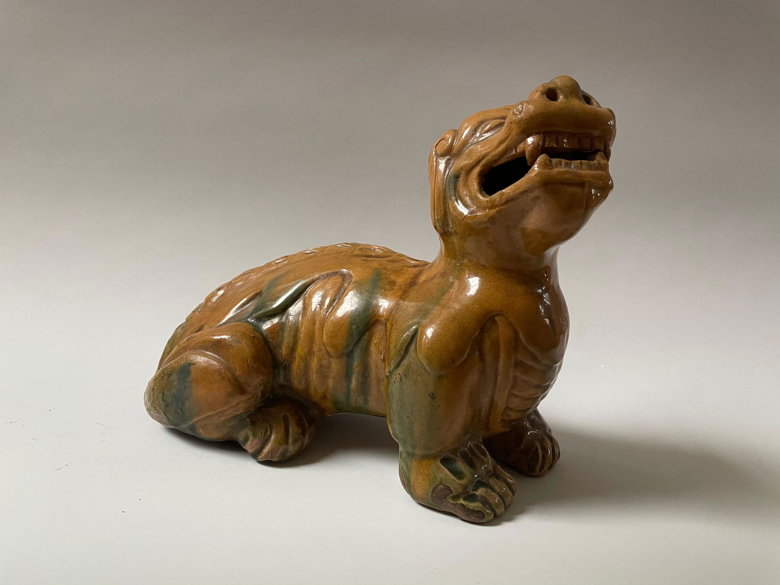 A Chinese Glazed Pottery Horned Beast Foo Dog Sculpture (1 of 6)