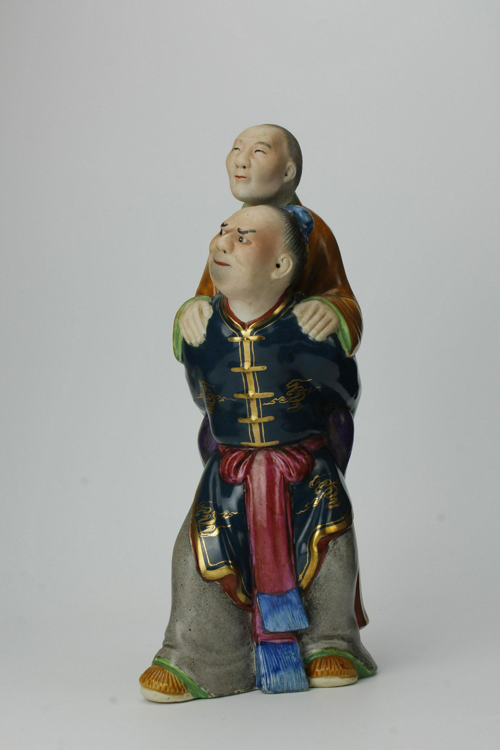 A Chinese Ceramic Figurine of Son Carrying Mother (1 of 6)