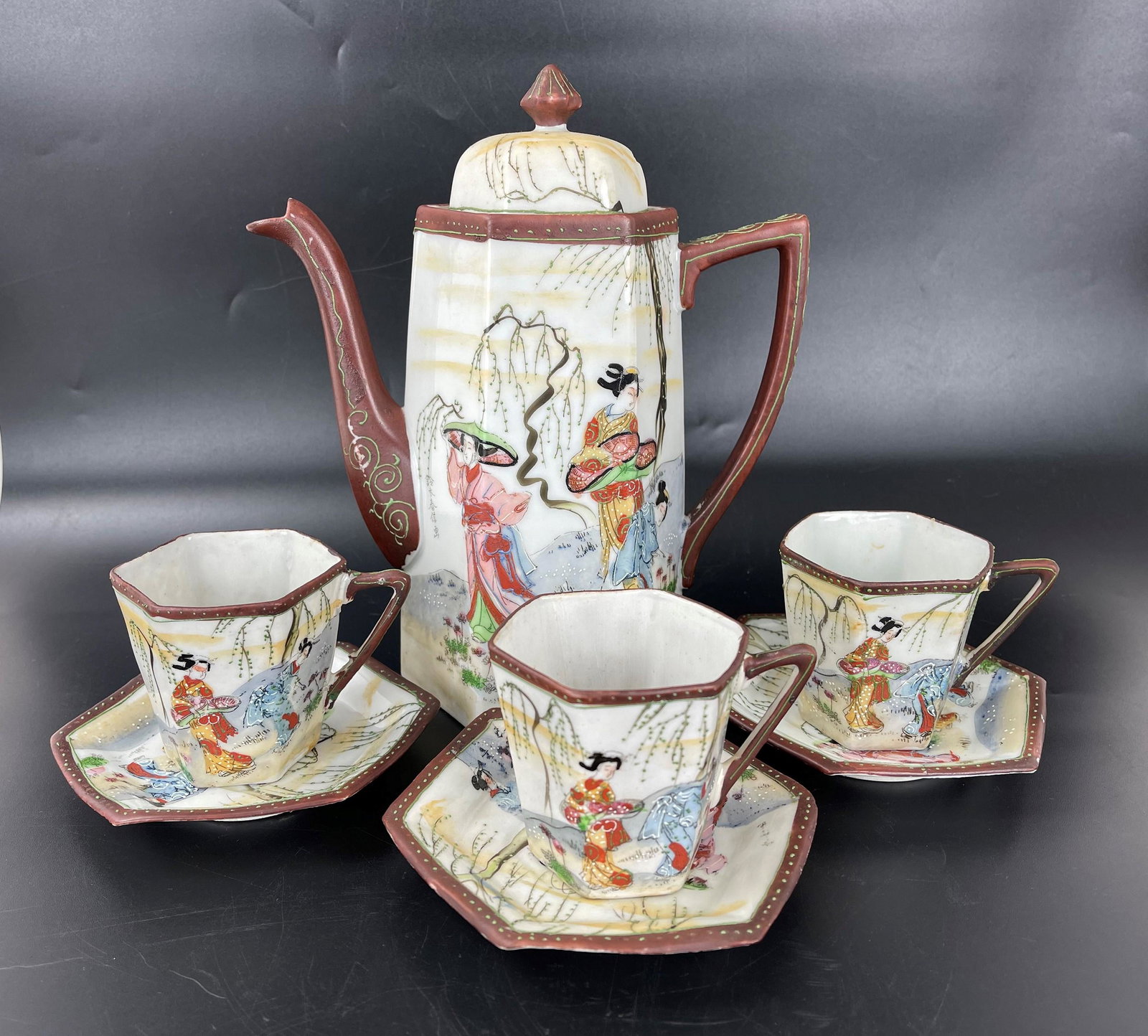 A Set of Porcelain Teapot and Cups Suzuki Harunobu Mark: A Set of Japanese Porcelain Teapot and Cups Suzuki Harunobu Mark, pot H 9.5 in. (24 cm) cup H 2.5 in. (6.3 cm)